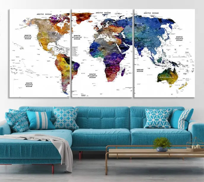 A contemporary living room features the School World Map Canvas Print, a vibrant and multi-panel artwork on museum-quality canvas. This piece is ready to hang, offering both easy installation and enduring appeal.