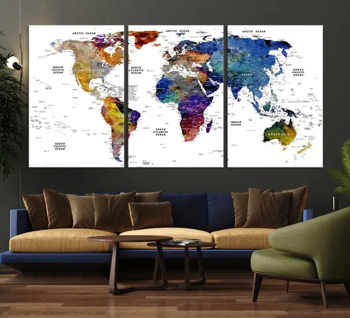 A contemporary living room features the School World Map Canvas Print, a vibrant and multi-panel artwork on museum-quality canvas. This piece is ready to hang, offering both easy installation and enduring appeal.