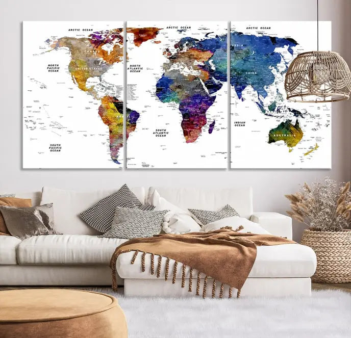 A contemporary living room features the School World Map Canvas Print, a vibrant and multi-panel artwork on museum-quality canvas. This piece is ready to hang, offering both easy installation and enduring appeal.