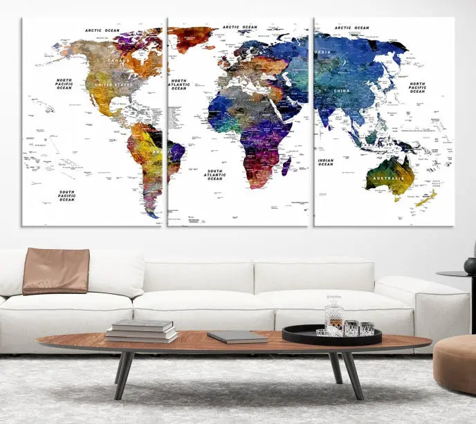 A contemporary living room features the School World Map Canvas Print, a vibrant and multi-panel artwork on museum-quality canvas. This piece is ready to hang, offering both easy installation and enduring appeal.