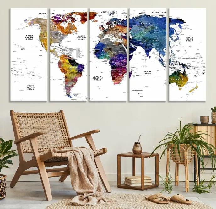 A contemporary living room features the School World Map Canvas Print, a vibrant and multi-panel artwork on museum-quality canvas. This piece is ready to hang, offering both easy installation and enduring appeal.