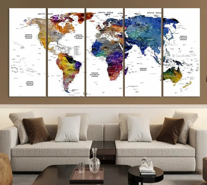 A contemporary living room features the School World Map Canvas Print, a vibrant and multi-panel artwork on museum-quality canvas. This piece is ready to hang, offering both easy installation and enduring appeal.