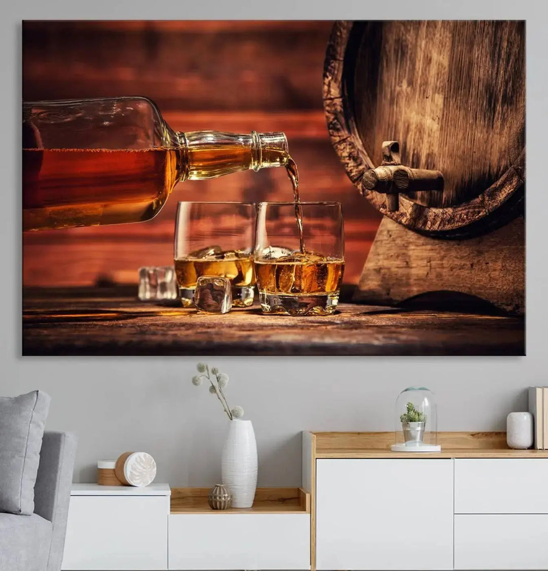 The Scotch Whiskey Barrel Cigar Bourbon Wall Art Canvas Print is a hand-assembled triptych depicting whiskey flowing into glasses, set against a backdrop of barrels. Crafted on museum-quality canvas, this piece adds an elegant touch to any room and includes free shipping for added convenience.