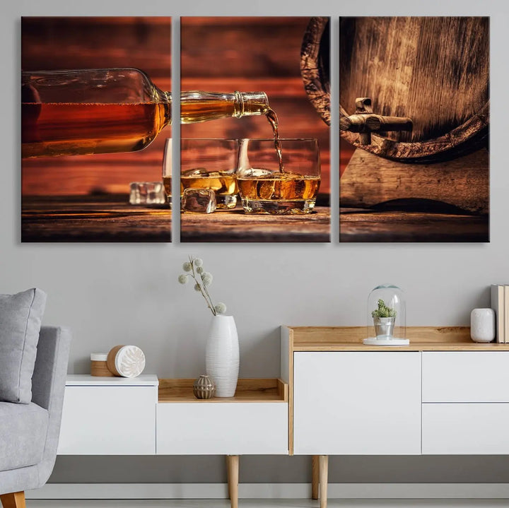 The Scotch Whiskey Barrel Cigar Bourbon Wall Art Canvas Print is a hand-assembled triptych depicting whiskey flowing into glasses, set against a backdrop of barrels. Crafted on museum-quality canvas, this piece adds an elegant touch to any room and includes free shipping for added convenience.