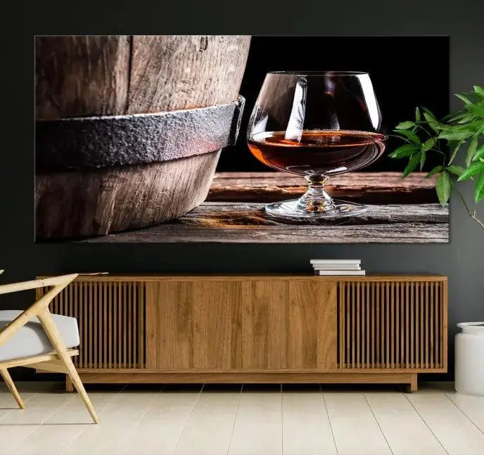 The Scots Whiskey Wall Art Canvas Print, a triptych gallery-wrapped piece crafted with museum-quality precision, showcases a barrel and a glass of whiskey on a wooden table. It includes a UV-protective coating for durability.