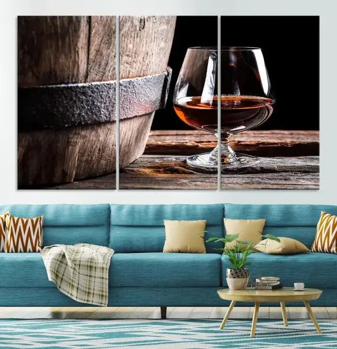 The Scots Whiskey Wall Art Canvas Print, a triptych gallery-wrapped piece crafted with museum-quality precision, showcases a barrel and a glass of whiskey on a wooden table. It includes a UV-protective coating for durability.