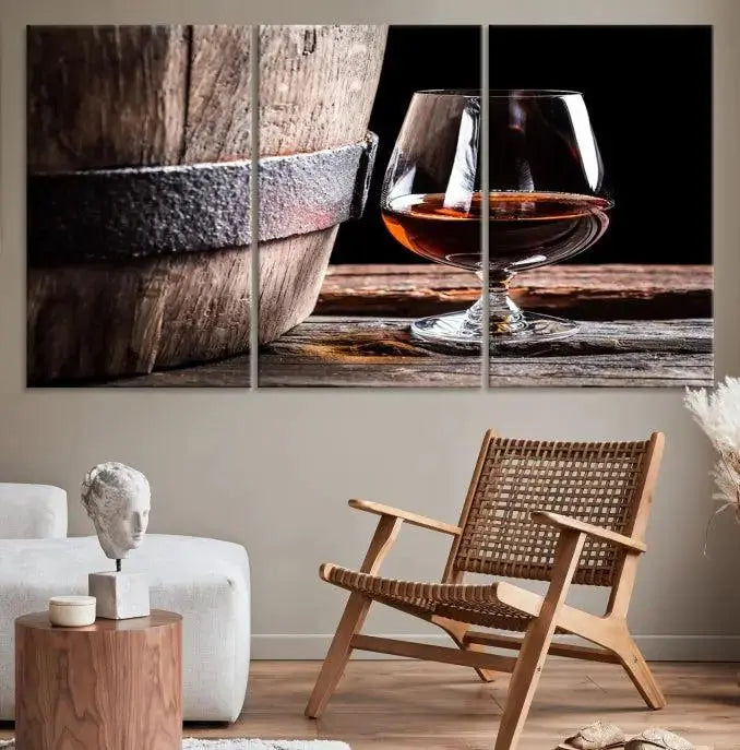 The Scots Whiskey Wall Art Canvas Print, a triptych gallery-wrapped piece crafted with museum-quality precision, showcases a barrel and a glass of whiskey on a wooden table. It includes a UV-protective coating for durability.