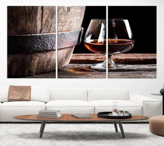 The Scots Whiskey Wall Art Canvas Print, a triptych gallery-wrapped piece crafted with museum-quality precision, showcases a barrel and a glass of whiskey on a wooden table. It includes a UV-protective coating for durability.