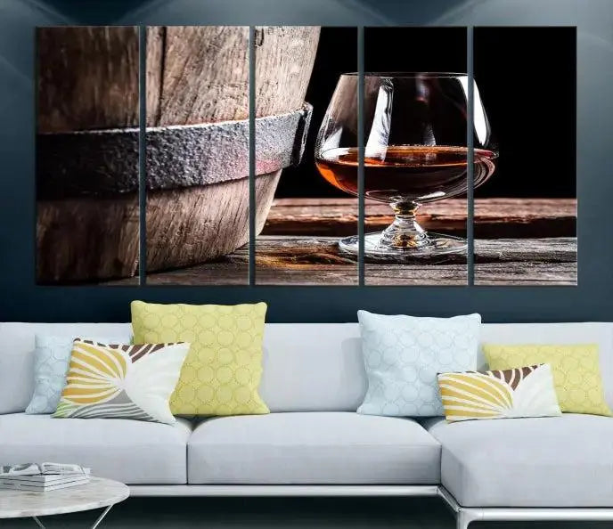 The Scots Whiskey Wall Art Canvas Print, a triptych gallery-wrapped piece crafted with museum-quality precision, showcases a barrel and a glass of whiskey on a wooden table. It includes a UV-protective coating for durability.