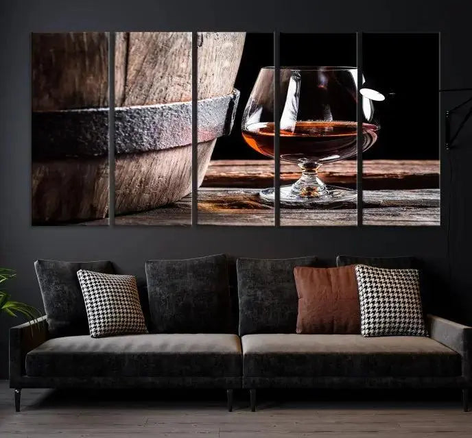 The Scots Whiskey Wall Art Canvas Print, a triptych gallery-wrapped piece crafted with museum-quality precision, showcases a barrel and a glass of whiskey on a wooden table. It includes a UV-protective coating for durability.