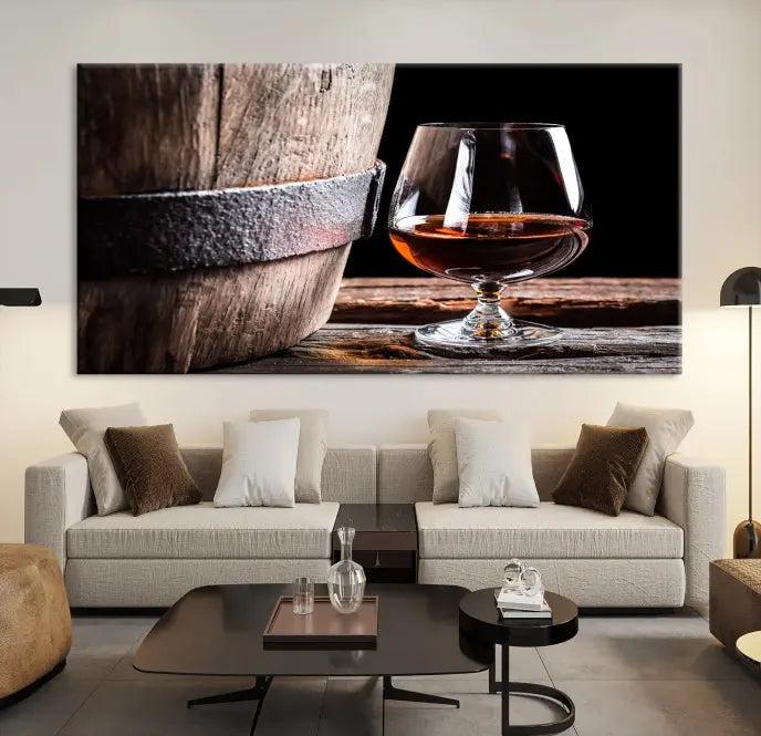 The Scots Whiskey Wall Art Canvas Print, a triptych gallery-wrapped piece crafted with museum-quality precision, showcases a barrel and a glass of whiskey on a wooden table. It includes a UV-protective coating for durability.