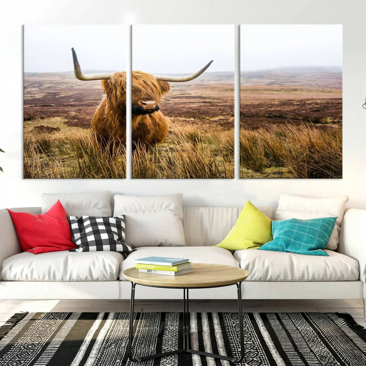 Hanging on the wall is a triptych of the "Scottish Highland Cow Cattle Art Print Farmhouse Wall Art Canvas Print." This museum-quality canvas is ready to hang and features a UV-protective coating, ensuring lasting vibrancy.