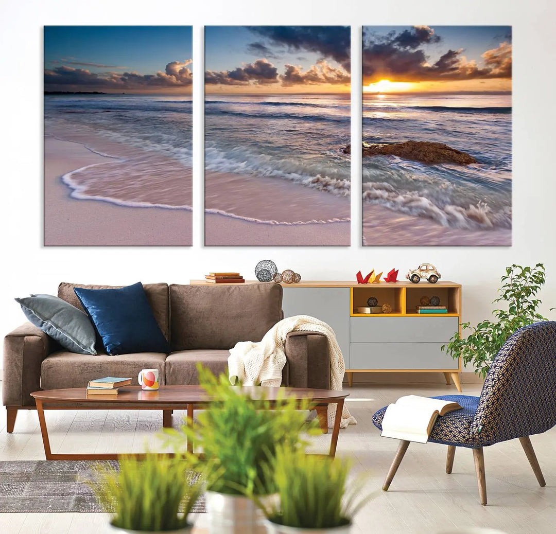 The modern living room is highlighted by a Sea Ocean Sunset Beach Wall Art Canvas Print on the wall, adding a serene coastal touch to the space.