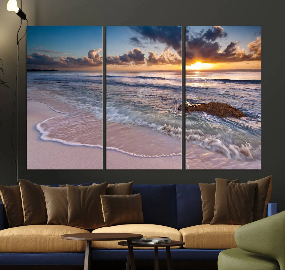 The modern living room is highlighted by a Sea Ocean Sunset Beach Wall Art Canvas Print on the wall, adding a serene coastal touch to the space.