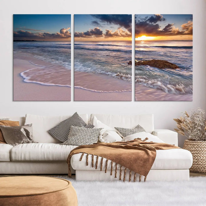 The modern living room is highlighted by a Sea Ocean Sunset Beach Wall Art Canvas Print on the wall, adding a serene coastal touch to the space.