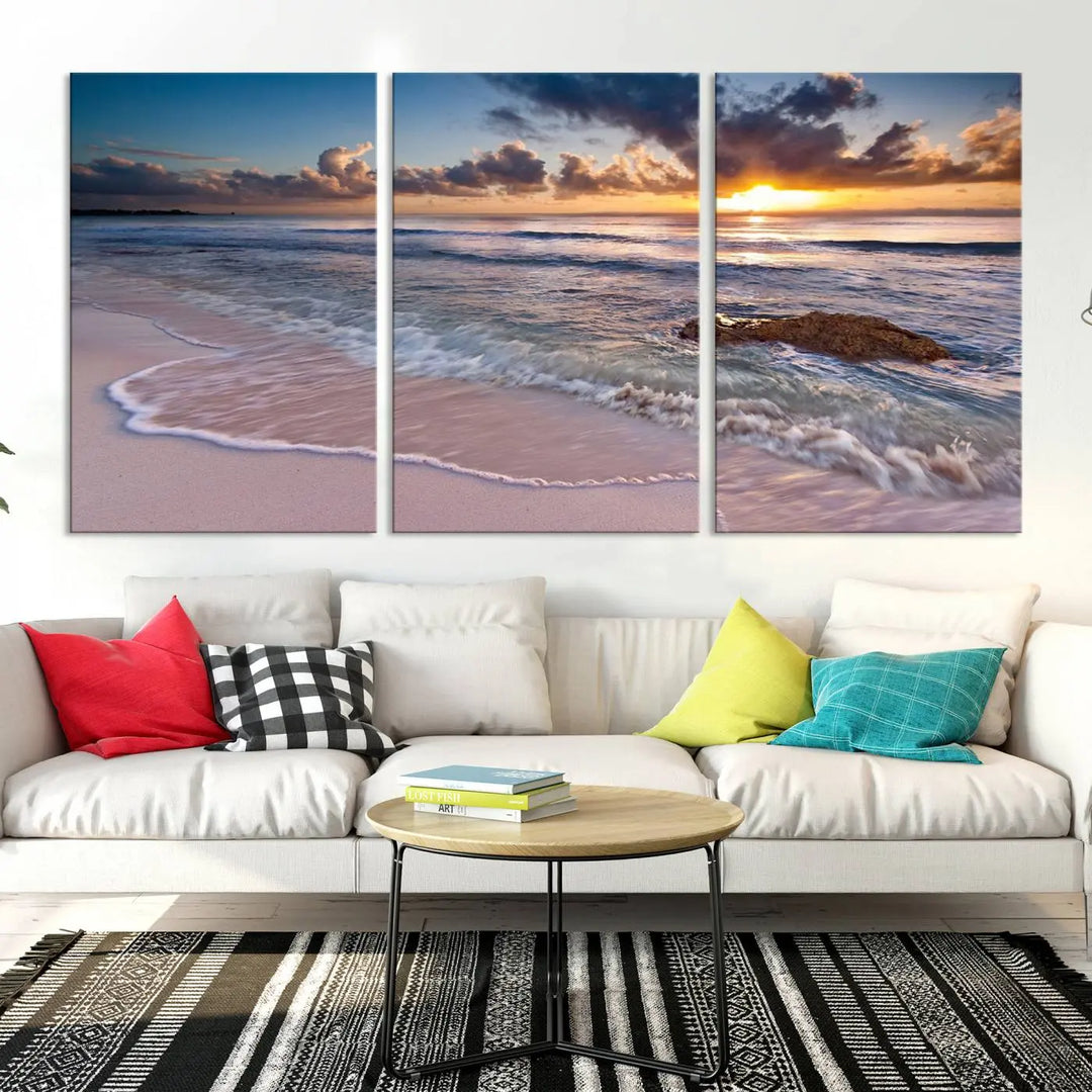 The modern living room is highlighted by a Sea Ocean Sunset Beach Wall Art Canvas Print on the wall, adding a serene coastal touch to the space.