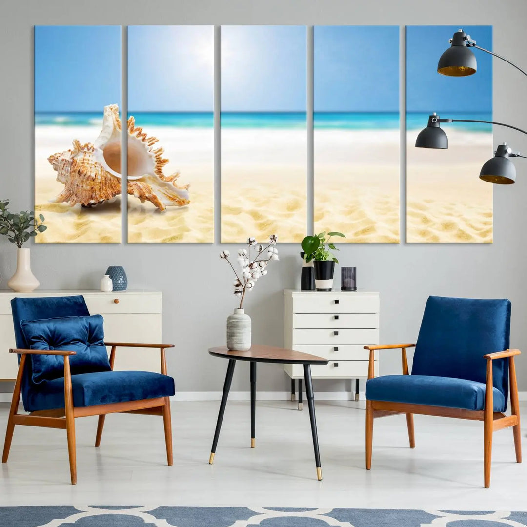 The Sea Shell on The Beach Sun Sand Wall Art Canvas Print is a triptych that beautifully captures a beach scene with a large seashell on the sand.