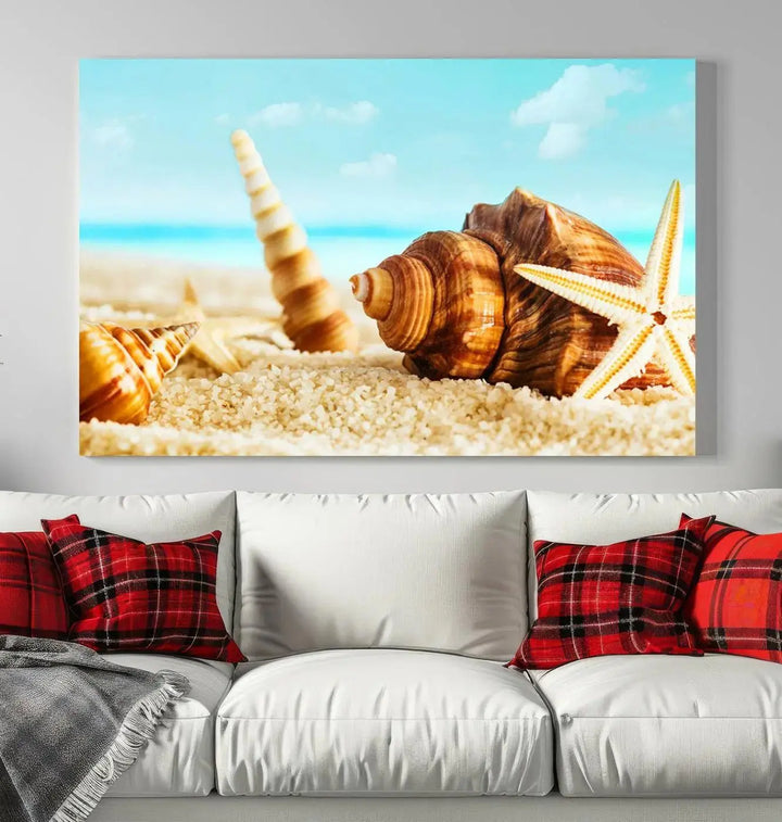 The "Sea Shells by the Beach Wall Art Canvas Print" features seashells and a starfish, crafted on museum-quality canvas. It comes ready to hang, instantly infusing any space with a coastal vibe.