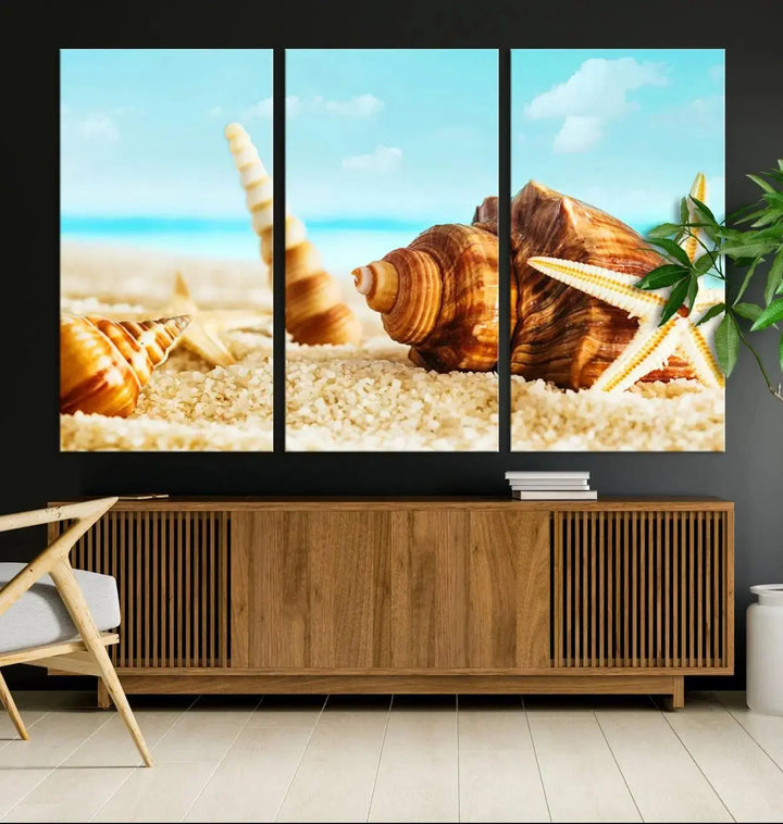 The "Sea Shells by the Beach Wall Art Canvas Print" features seashells and a starfish, crafted on museum-quality canvas. It comes ready to hang, instantly infusing any space with a coastal vibe.