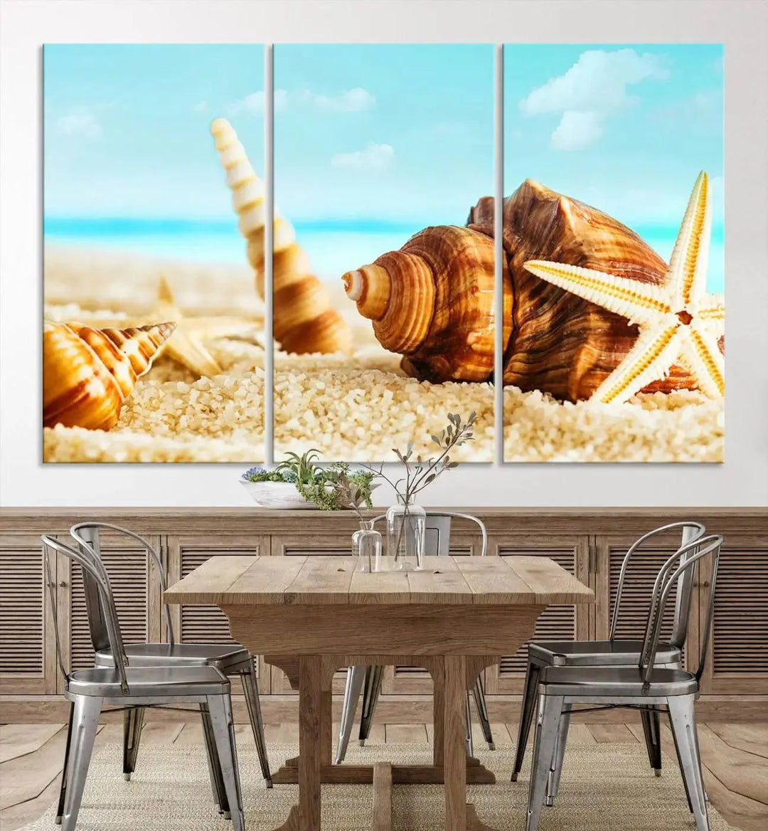 The "Sea Shells by the Beach Wall Art Canvas Print" features seashells and a starfish, crafted on museum-quality canvas. It comes ready to hang, instantly infusing any space with a coastal vibe.