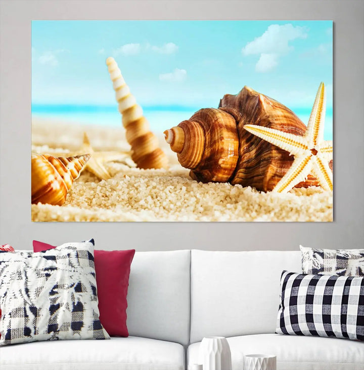 The "Sea Shells by the Beach Wall Art Canvas Print" features seashells and a starfish, crafted on museum-quality canvas. It comes ready to hang, instantly infusing any space with a coastal vibe.