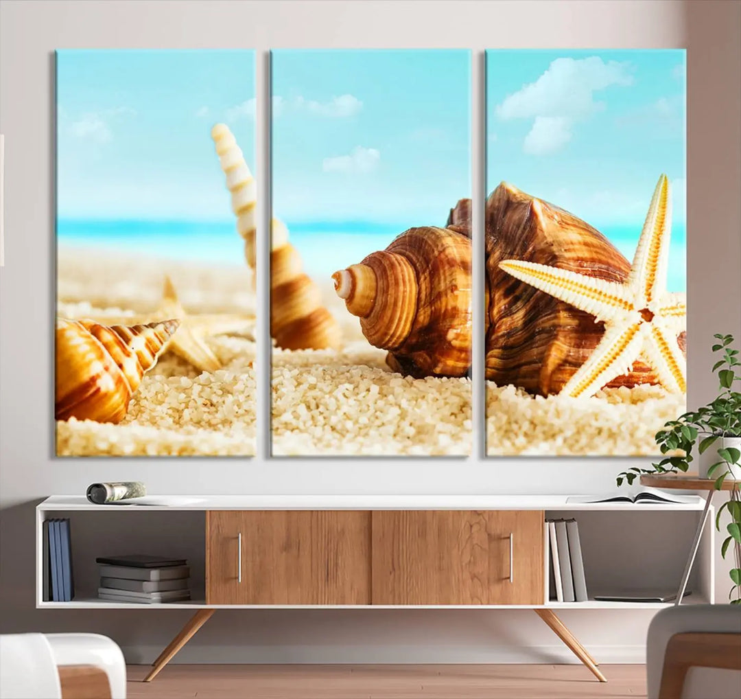 The "Sea Shells by the Beach Wall Art Canvas Print" features seashells and a starfish, crafted on museum-quality canvas. It comes ready to hang, instantly infusing any space with a coastal vibe.