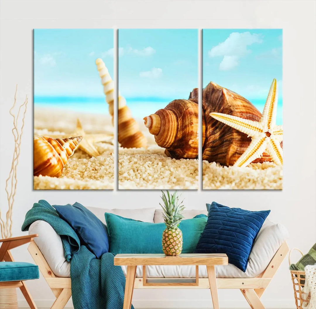 The "Sea Shells by the Beach Wall Art Canvas Print" features seashells and a starfish, crafted on museum-quality canvas. It comes ready to hang, instantly infusing any space with a coastal vibe.