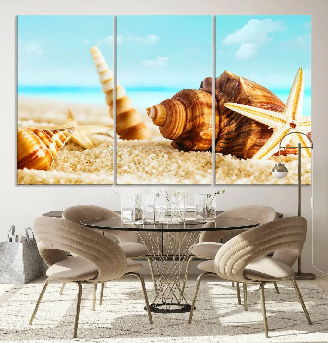 The "Sea Shells by the Beach Wall Art Canvas Print" features seashells and a starfish, crafted on museum-quality canvas. It comes ready to hang, instantly infusing any space with a coastal vibe.