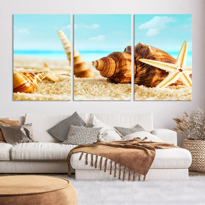 The "Sea Shells by the Beach Wall Art Canvas Print" features seashells and a starfish, crafted on museum-quality canvas. It comes ready to hang, instantly infusing any space with a coastal vibe.