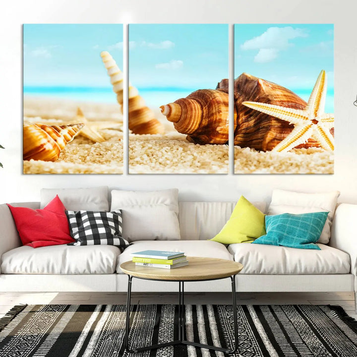 The "Sea Shells by the Beach Wall Art Canvas Print" features seashells and a starfish, crafted on museum-quality canvas. It comes ready to hang, instantly infusing any space with a coastal vibe.