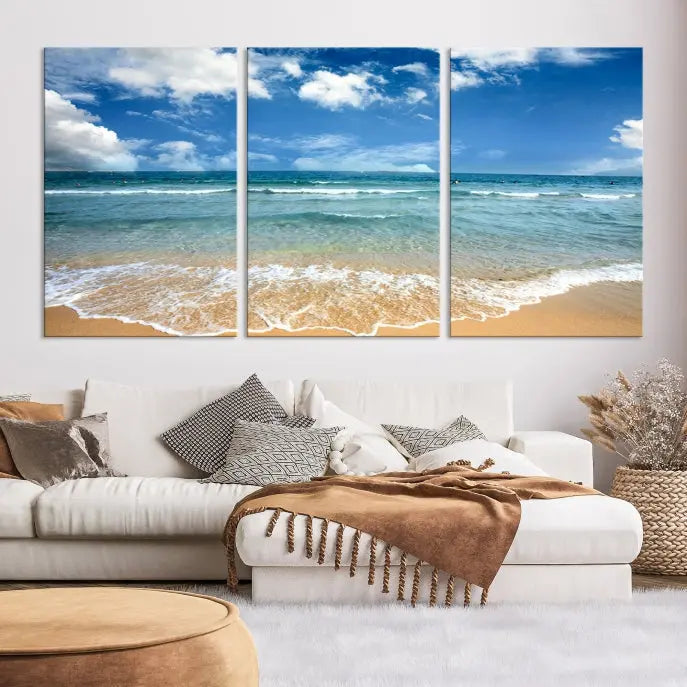 The "Sea View From the Beach Canvas Print" triptych adorns the wall. Each piece is printed on museum-quality canvas, ready to hang, and designed to preserve its vibrant colors with a UV-protective coating.