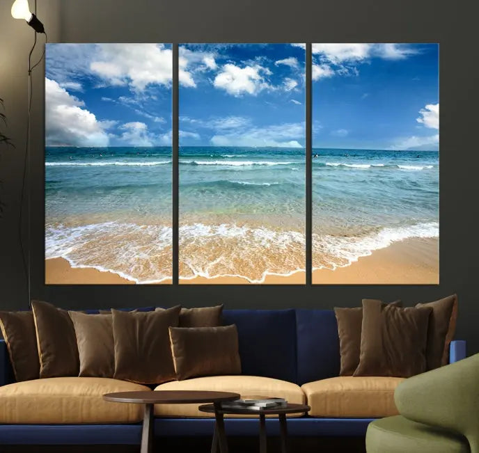 The "Sea View From the Beach Canvas Print" triptych adorns the wall. Each piece is printed on museum-quality canvas, ready to hang, and designed to preserve its vibrant colors with a UV-protective coating.