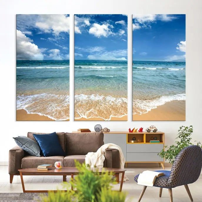 The "Sea View From the Beach Canvas Print" triptych adorns the wall. Each piece is printed on museum-quality canvas, ready to hang, and designed to preserve its vibrant colors with a UV-protective coating.