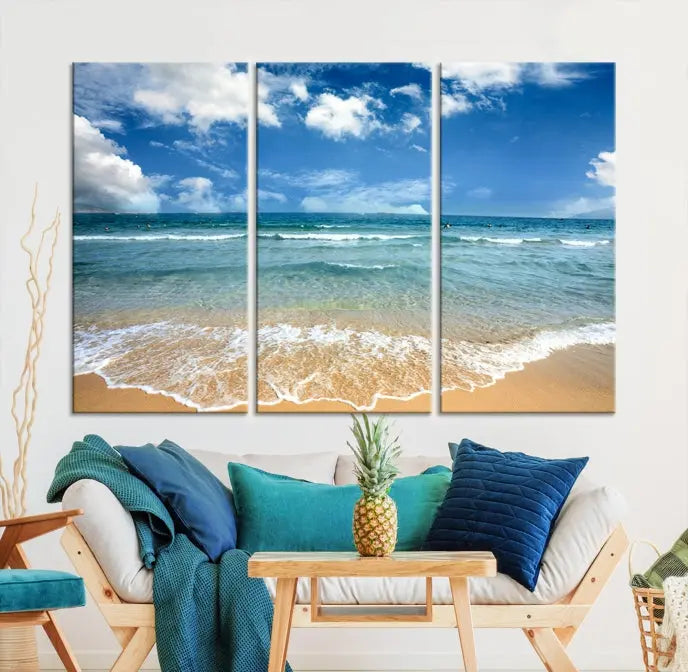 The "Sea View From the Beach Canvas Print" triptych adorns the wall. Each piece is printed on museum-quality canvas, ready to hang, and designed to preserve its vibrant colors with a UV-protective coating.