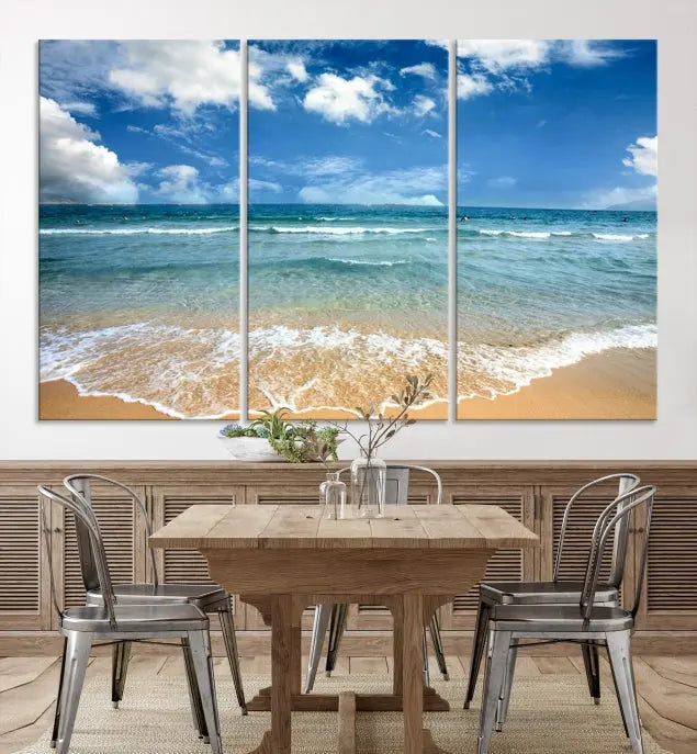 The "Sea View From the Beach Canvas Print" triptych adorns the wall. Each piece is printed on museum-quality canvas, ready to hang, and designed to preserve its vibrant colors with a UV-protective coating.