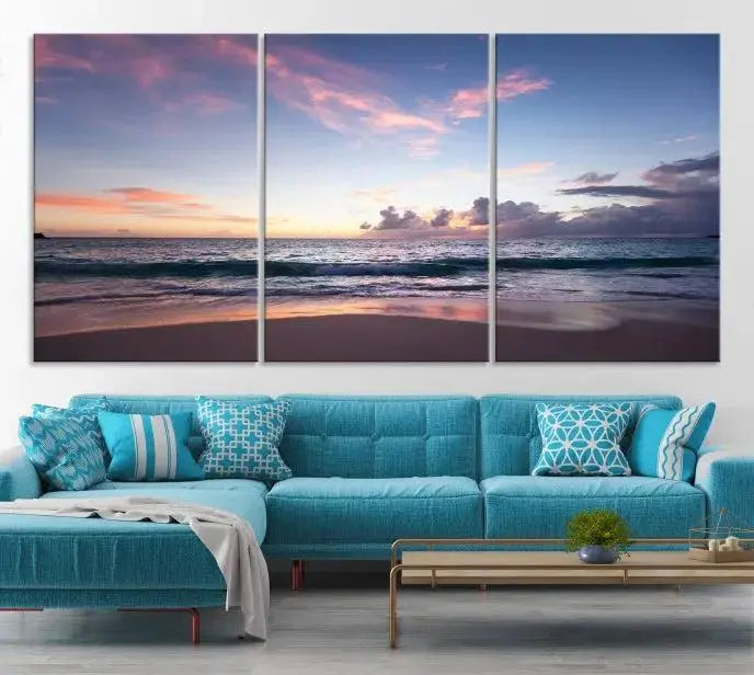 A triptych of the "Sea and Beach Wall Art Canvas Print" hangs elegantly in the modern living room. The gallery-wrapped artwork, printed on museum-quality canvas, is beautifully enhanced by its elegantly hand-assembled frame, adding an elegant touch to the space.