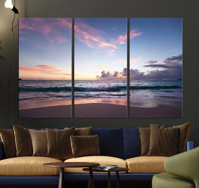 A triptych of the "Sea and Beach Wall Art Canvas Print" hangs elegantly in the modern living room. The gallery-wrapped artwork, printed on museum-quality canvas, is beautifully enhanced by its elegantly hand-assembled frame, adding an elegant touch to the space.