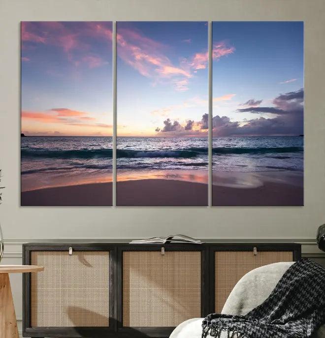 A triptych of the "Sea and Beach Wall Art Canvas Print" hangs elegantly in the modern living room. The gallery-wrapped artwork, printed on museum-quality canvas, is beautifully enhanced by its elegantly hand-assembled frame, adding an elegant touch to the space.