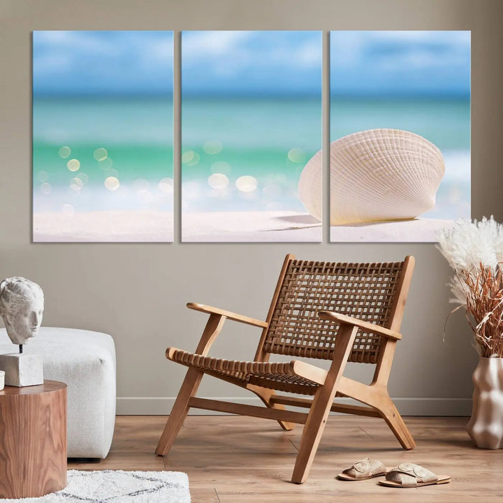 The "Seashell on The Beach Wall Art Canvas Print" features a triptych photo of a seashell on a sandy beach. This artwork is printed on gallery-wrapped, museum-quality canvas with a UV-protective coating.