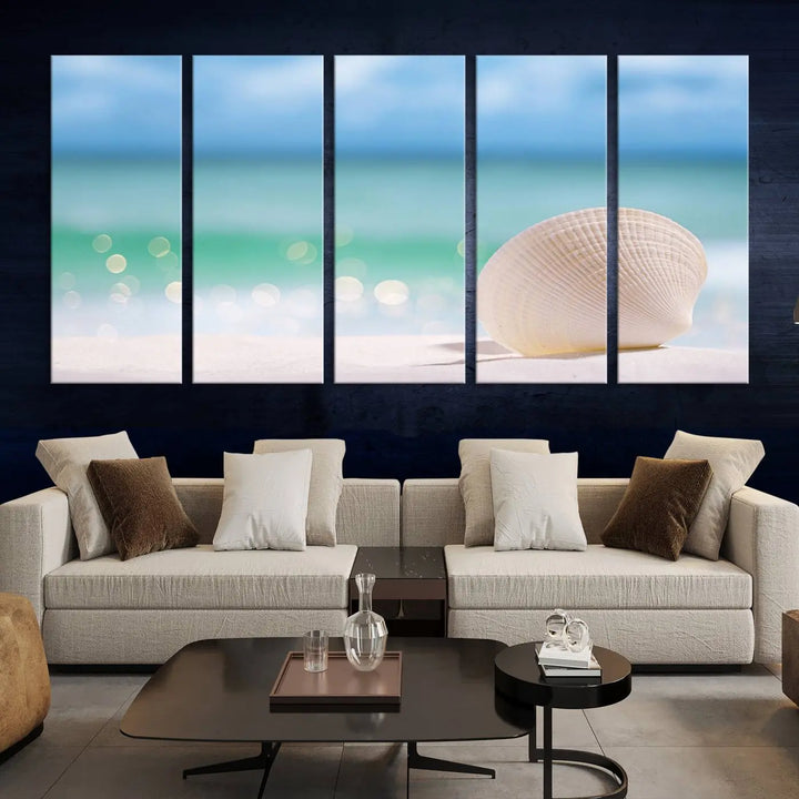 The "Seashell on The Beach Wall Art Canvas Print" features a triptych photo of a seashell on a sandy beach. This artwork is printed on gallery-wrapped, museum-quality canvas with a UV-protective coating.