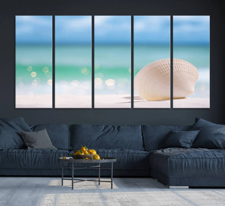 The "Seashell on The Beach Wall Art Canvas Print" features a triptych photo of a seashell on a sandy beach. This artwork is printed on gallery-wrapped, museum-quality canvas with a UV-protective coating.