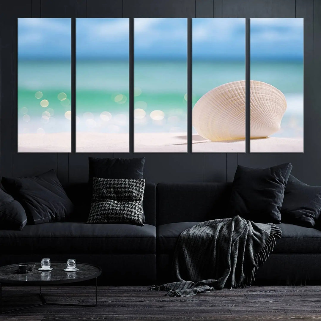 The "Seashell on The Beach Wall Art Canvas Print" features a triptych photo of a seashell on a sandy beach. This artwork is printed on gallery-wrapped, museum-quality canvas with a UV-protective coating.