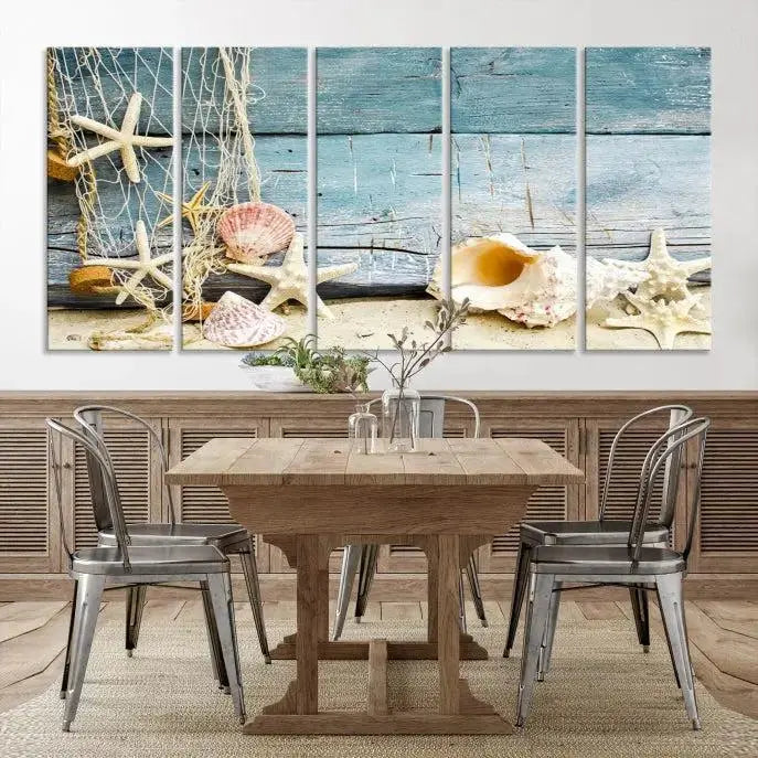 The beautiful three-panel canvas print, "Seashells on Rustic Wooden Background," features seashells and starfish against a blue wood background. The gallery-wrapped panels are coated with UV protection to ensure long-lasting vibrancy.