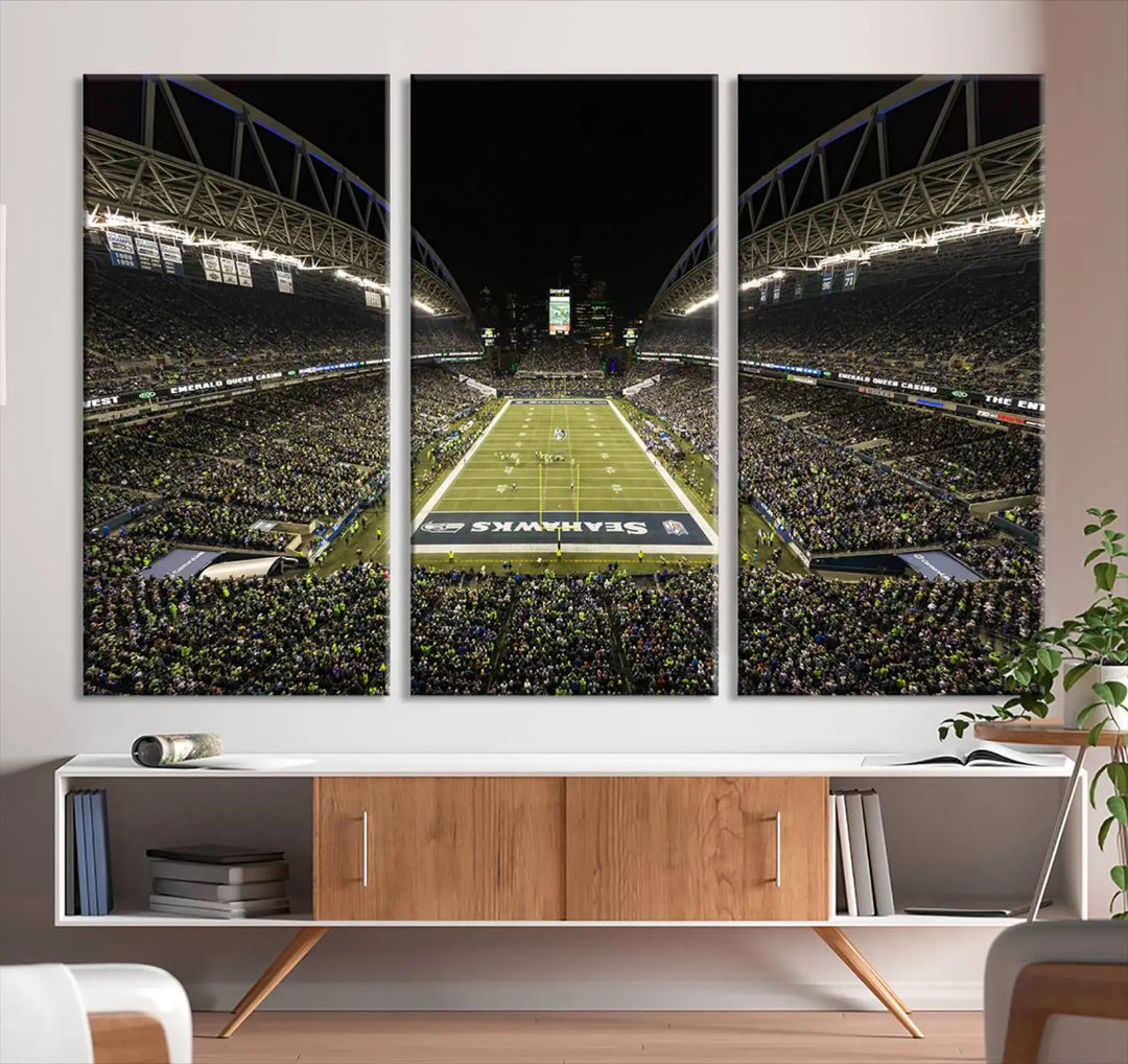 A three-panel wall art piece depicting the Seattle Seahawks' CenturyLink Field stadium adorns the space. This premium canvas, handmade in the USA, showcases quality and captures the fervor of sports enthusiasts.