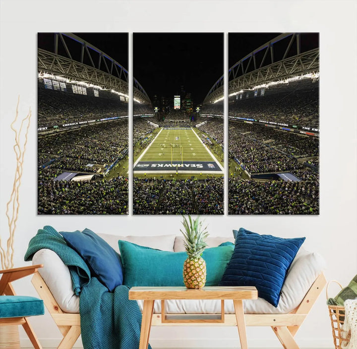 A three-panel wall art piece depicting the Seattle Seahawks' CenturyLink Field stadium adorns the space. This premium canvas, handmade in the USA, showcases quality and captures the fervor of sports enthusiasts.