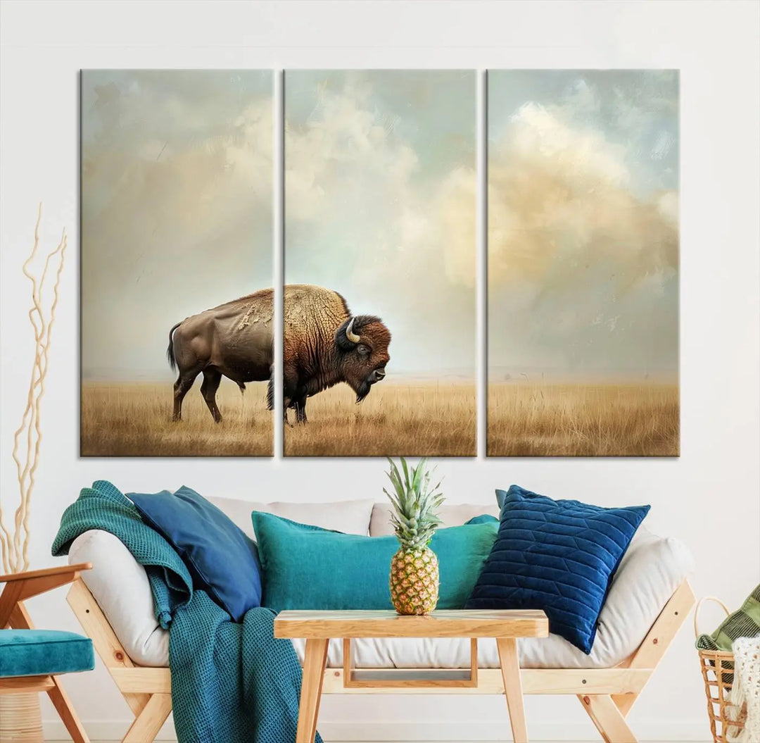 A Sepia American Bison Wall Art Print for Farmhouse Wall Decor adorns the wall, featuring a majestic bison on a grassy plain. Its Western Canvas Print finish adds sophistication to the space.