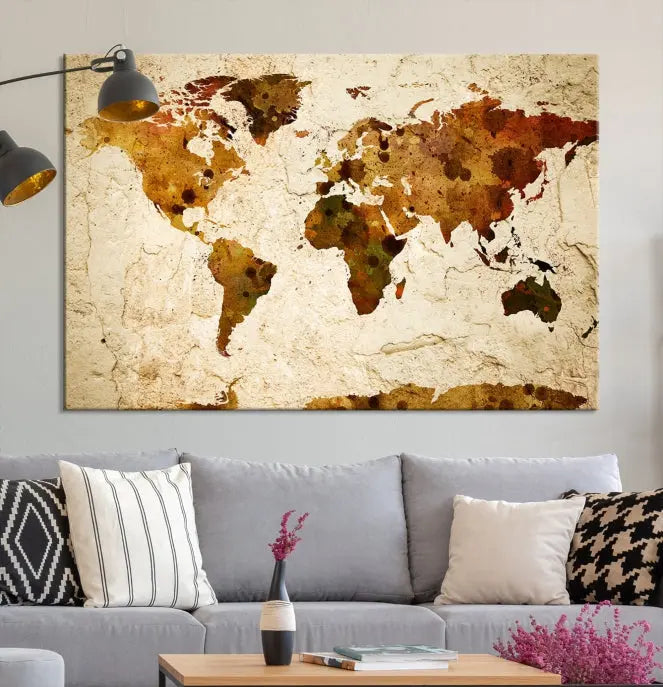 The Sepia World Map Wall Art Canvas Print showcases a vintage world map on a textured background, expertly mounted on museum-quality canvas with a UV-protective coating.