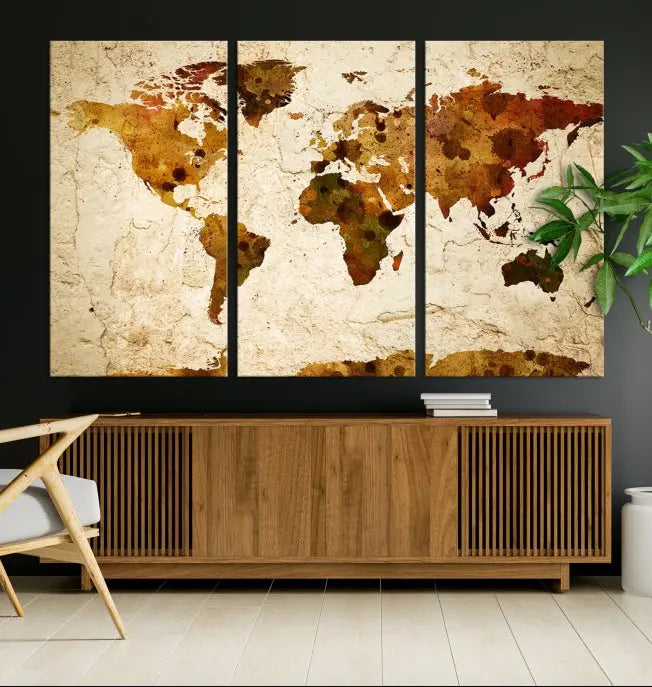 The Sepia World Map Wall Art Canvas Print showcases a vintage world map on a textured background, expertly mounted on museum-quality canvas with a UV-protective coating.