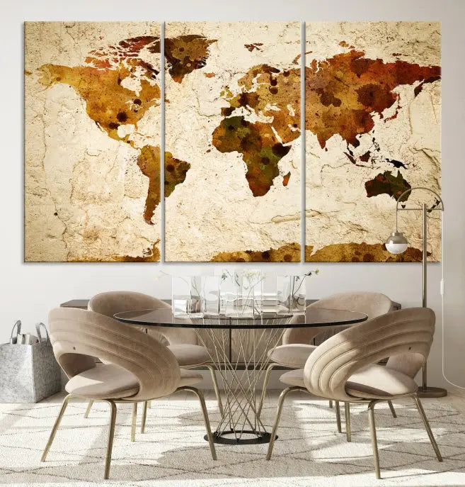 The Sepia World Map Wall Art Canvas Print showcases a vintage world map on a textured background, expertly mounted on museum-quality canvas with a UV-protective coating.