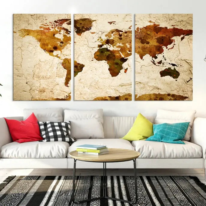 The Sepia World Map Wall Art Canvas Print showcases a vintage world map on a textured background, expertly mounted on museum-quality canvas with a UV-protective coating.